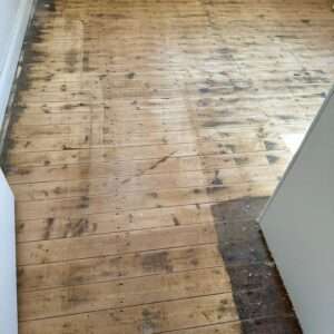 Precise Floor Sanding Sydney team working on large timber floor restoration project