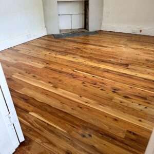 Timber floor sanding and polishing in a hallway of a Sydney home