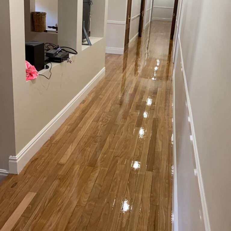 Restoring sun-faded timber floorboards in a Sydney home after UV damage